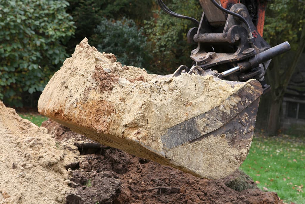 Uitgraving en grondvoorbereiding met de graafmachine